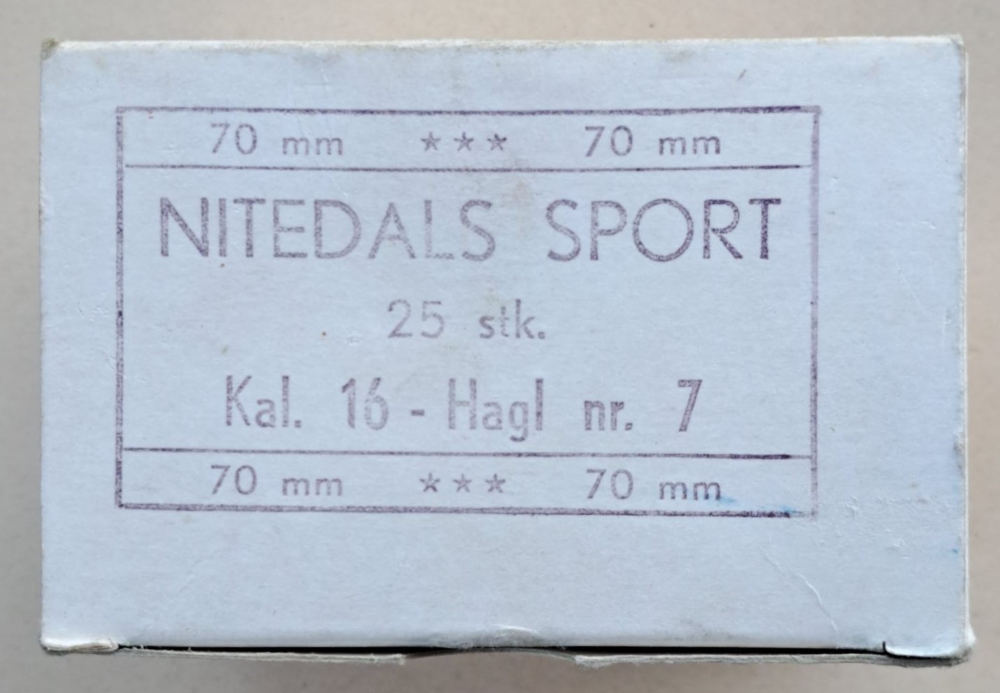 ./ammo/hagle/esker/Eske-Hagle-Nitedals-Sport-Papp-25skudd-16-70-Nr7-Gummistemplet-Svart-1.jpg