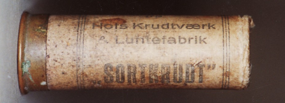 ./ammo/hagle/patroner/Patron-Hagle-Hoff-Sortkrudt-Brun-12-65-2.jpg